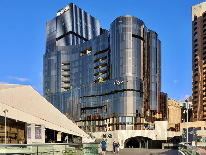 The curved glass SkyCity Adelaide building beside the Festival Centre on North Terrace